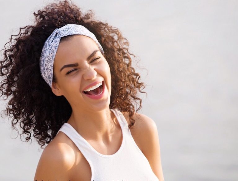 Woman with radiant skin after BBL treatment